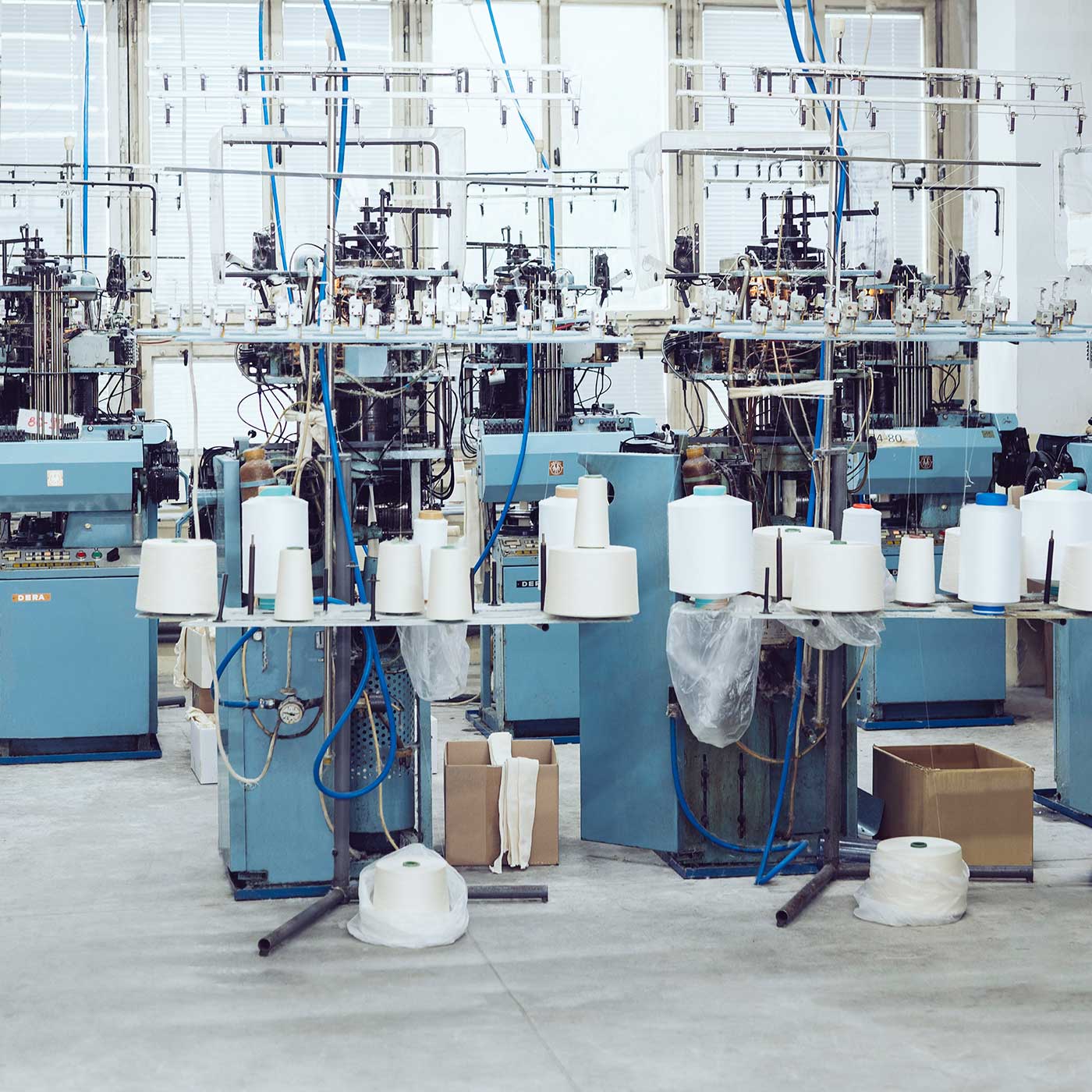 Knitting machines at PEQNE factory